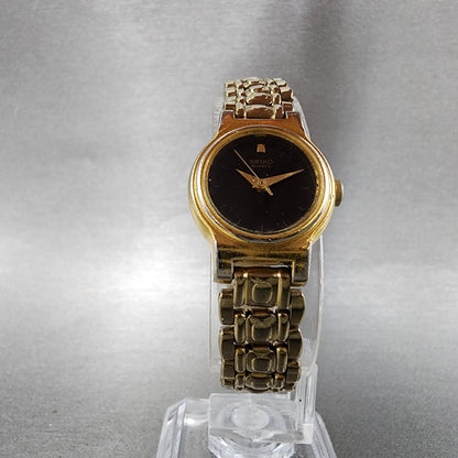 Seiko Watch Women 19mm Black Dial Gold Tone Round V4010518 New Battery5