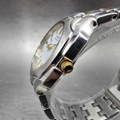 Citizen Eco-Drive Watch Women 25mm White Dial Two Tone Date Round E011 Works2