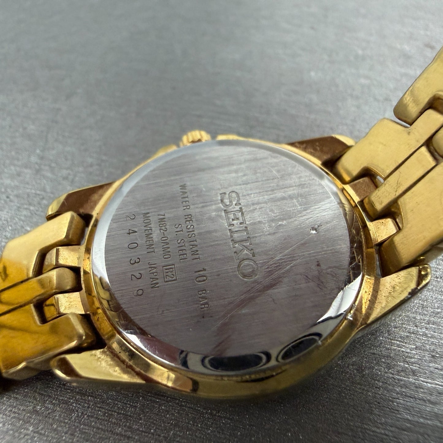 Seiko Watch Women 26mm Silver Dial Gold Tone Date Round 7N82-0AM0 New Battery9