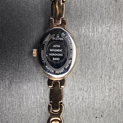Bulova Watch Women 17mm MOP Dial Gold Tone Gemmed Oval 98L200 New Battery AD10