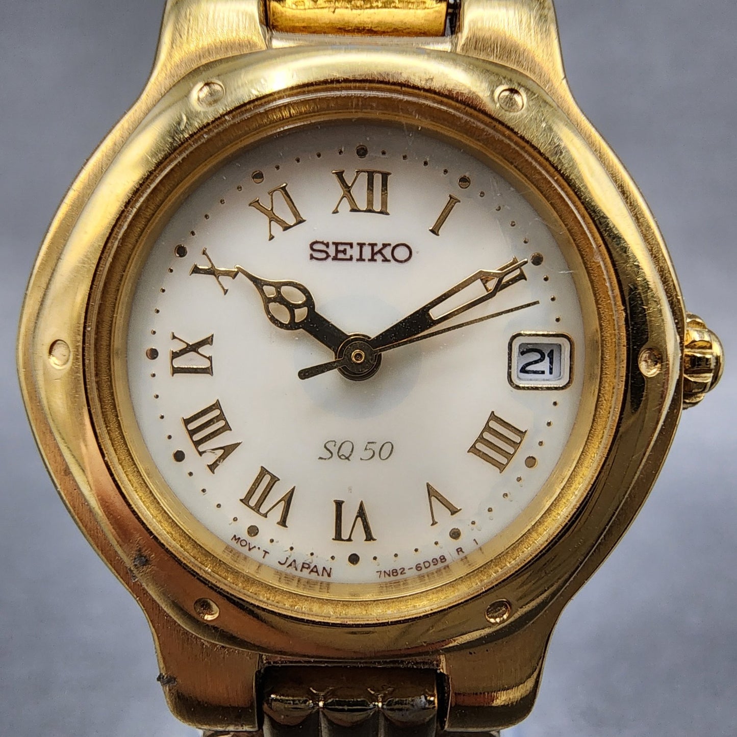 Seiko SQ 50 Watch Women 25mm White Dial Gold Tone Date Round 7N826C53 New Batt1