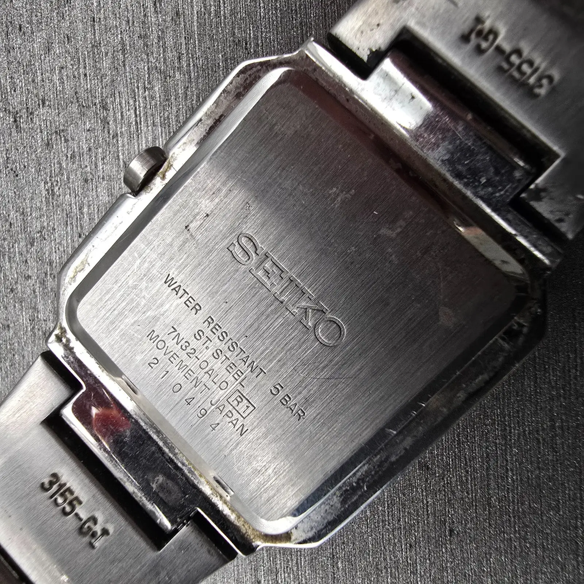 Seiko Watch Men 32mm Silver Dial Silver Tone Date Rectangle 7N32-0AL0 New Batt10