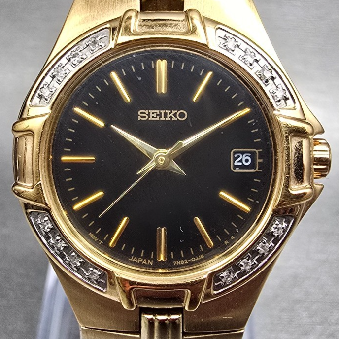 Seiko Watch Women 25mm Black Dial Gold Tone Date Diamonds 7N82-0DT0 New Battery1