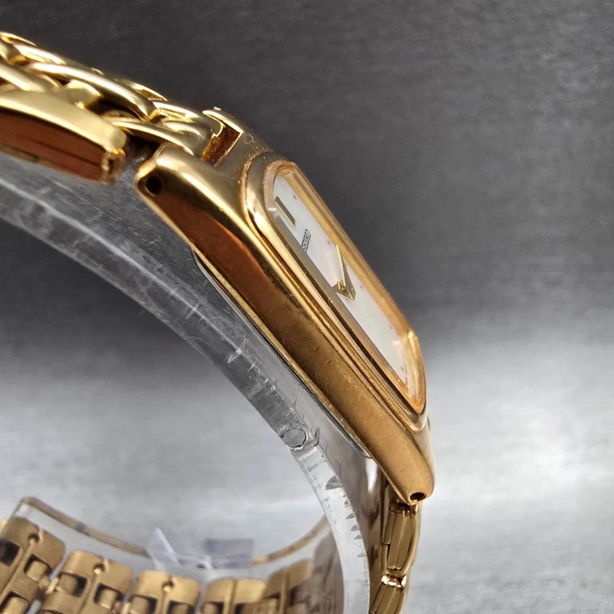 Seiko Tank Watch Women 13mm MOP Dial Gold Tone Rectangle 2E20-7279 New Battery3
