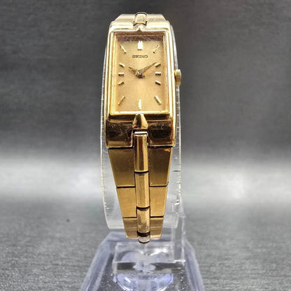 Seiko Tank Watch Women 13mm Gold Dial Gold Tone Rectangle 2E20-7479 New Battery55