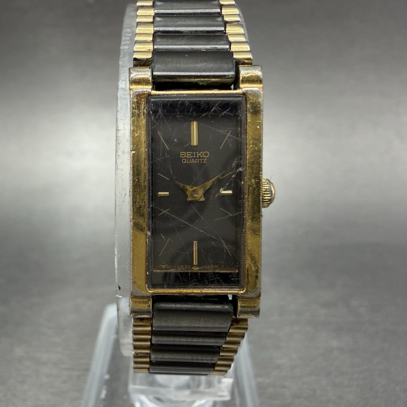 Seiko Tank Watch Women 13mm Black Dial Black & Gold Tone 1E20-551H New Battery0