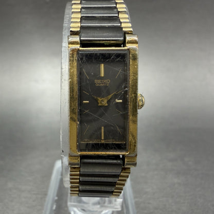 Seiko Tank Watch Women 13mm Black Dial Black & Gold Tone 1E20-551H New Battery0
