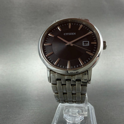 Citizen Eco-Drive Watch Men 37mm Black Dial Silver Tone Date E111-S067901 Works5