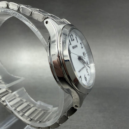 Citizen Reguno Watch Women 28mm White Dial Silver Tone Date Round Runs Solar3