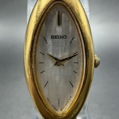 Seiko Watch Women 15mm Silver Dial Gold Tone Oval 2E207203 New Battery1