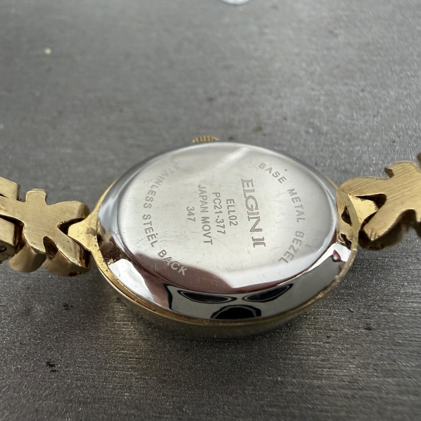 Elgin Watch Women 18mm MOP Dial Gold Tone Oval Ruby Diamond Bezel New Battery9