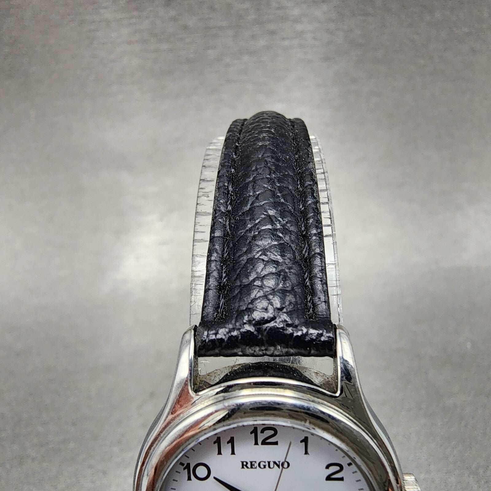 Citizen Reguno Watch Women 24mm White Dial Silver Tone Solar Round Runs E031T014