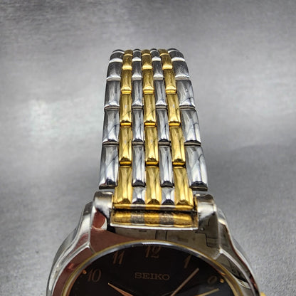 Seiko Watch Men 32mm Black Dial Two Tone Round V701-2B70 New Battery