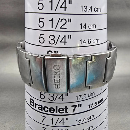 Seiko Watch Men 32mm Silver Dial Silver Tone Date Rectangle 7N32-0AL0 New Batt D9