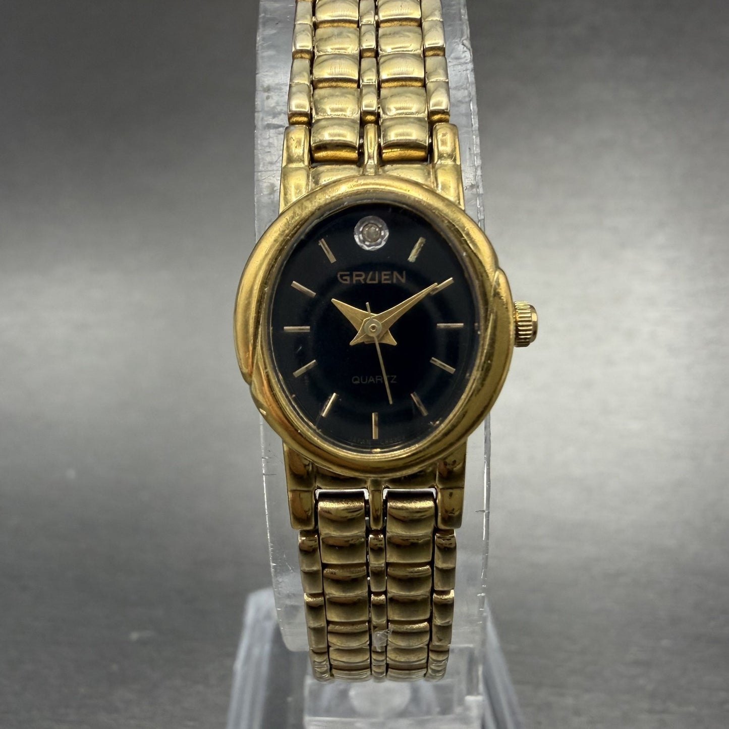 Gruen Watch Women 16mm Black Dial Gold Tone Oval new Battery Vintage0