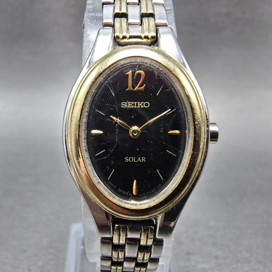 Seiko Solar Watch Women 20mm Black Dial Two Tone Oval V114-0AA0 Runs0