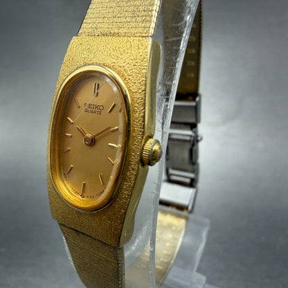 Seiko Watch Women 14mm Champagne Dial Gold Tone Oval 1F20-5C90 New Battery VTG2