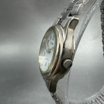 Seiko Alba Watch Women 23mm Silver Dial Silver Tone Date V782-X104 New Battery2