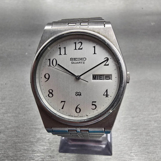 Seiko SQ Watch Men 34mm Silver Dial Silver Tone Daydate Round 6923-7039 New Batt0