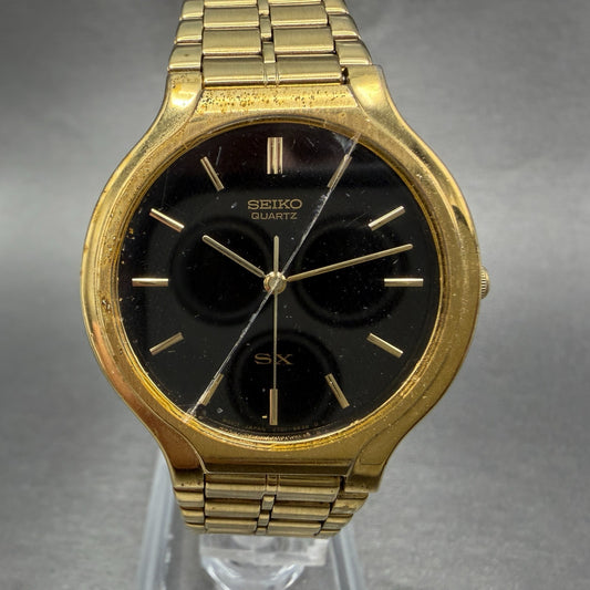 Seiko SX Watch Men 34mm Black Dial Gold Tone Round Vinatge V701-6K00 New Battery0