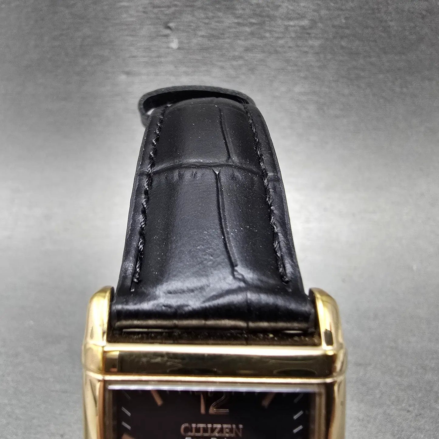 Citizen Eco-Drive Tank Watch Men 25mm Black Dial Rose Gold Tone Date Runs4