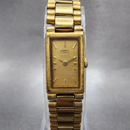 Seiko Tank Watch Women 13mm Champagne Dial Gold Tone 2e206320 New Battery0