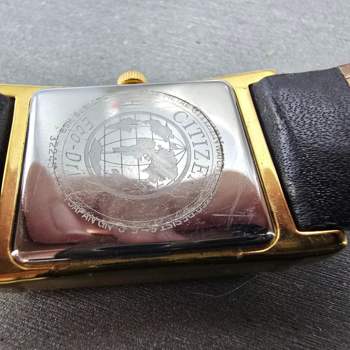 Citizen Eco-Drive Tank Watch Men 25mm White Dial Gold Rectangle Date Runs Jp9