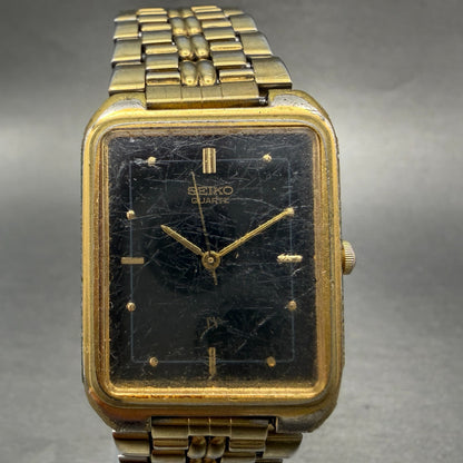 Seiko SX Tank Watch Men 26mm Black Dial Gold Tone Rectangle V701-5J00 NewBattery0