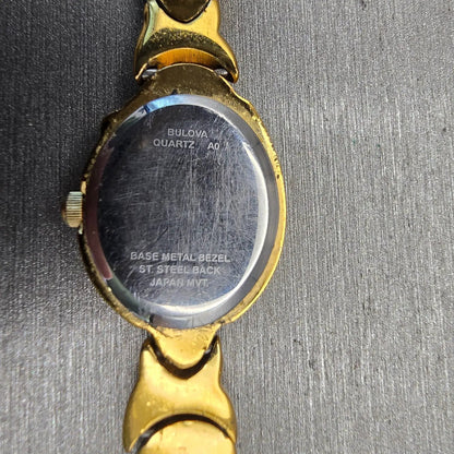 Bulova Watch Women 17mm MOP Dial Gold Tone Oval 97T67 New Battery10