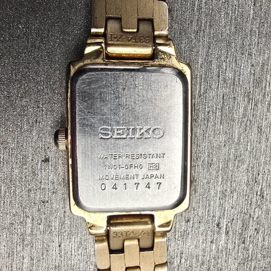 Seiko Tank Watch Women 16mm Champagne Dial Gold Tone Rectangle 1N01-0FH0 NewBatt10