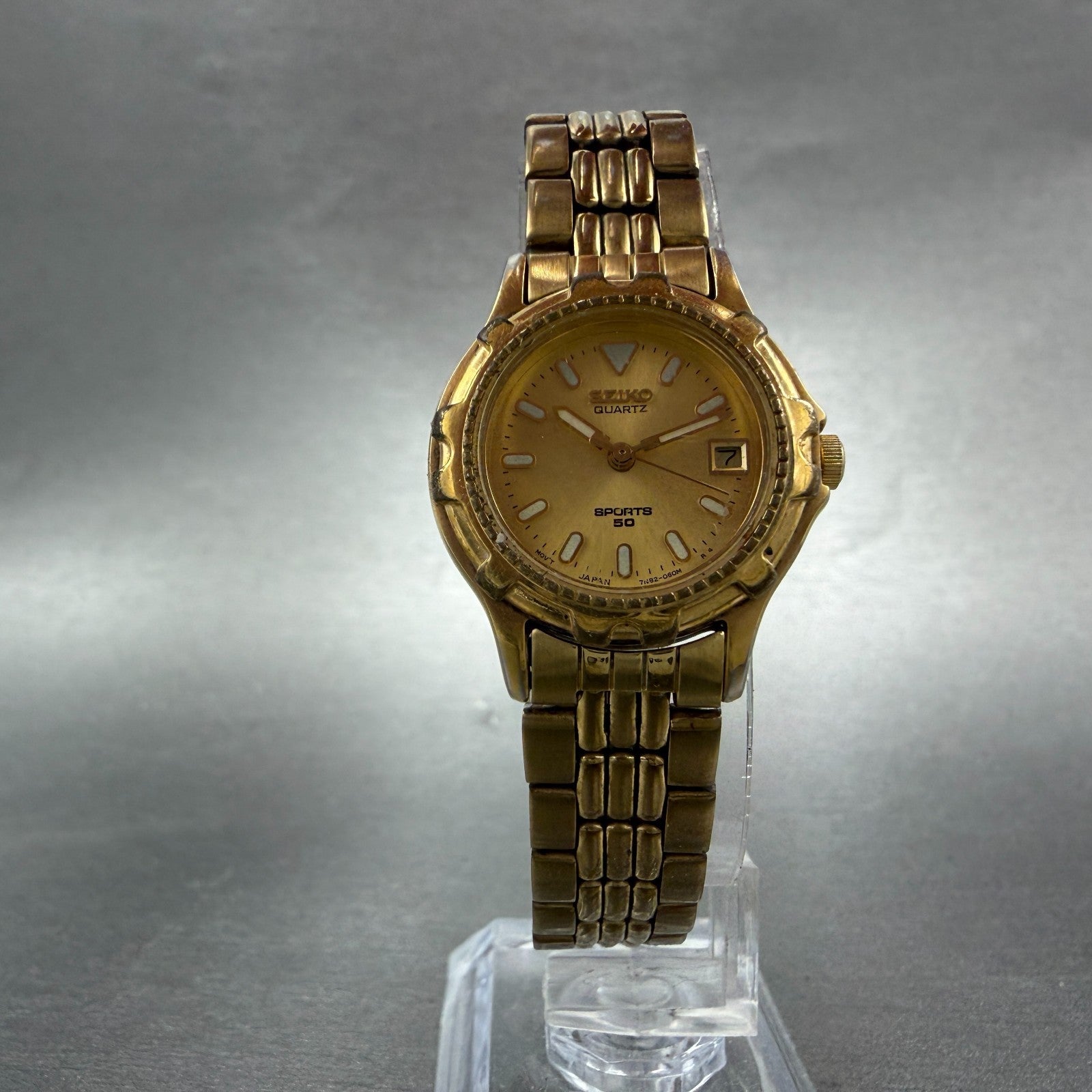 Seiko Sports 50 Watch Women 25mm Champagne Dial Gold Tone Date 7N82-0271 NewBatt5