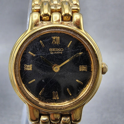 Seiko Watch Women 22mm Black Dial Gold Tone Round 1N00F030 New Battery1
