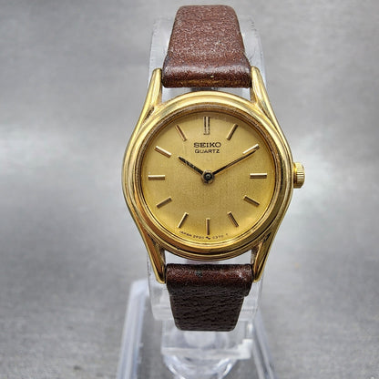 Seiko watch Women 19mm Champagne Dial Gold Tone Round 2p200089 New Battery0