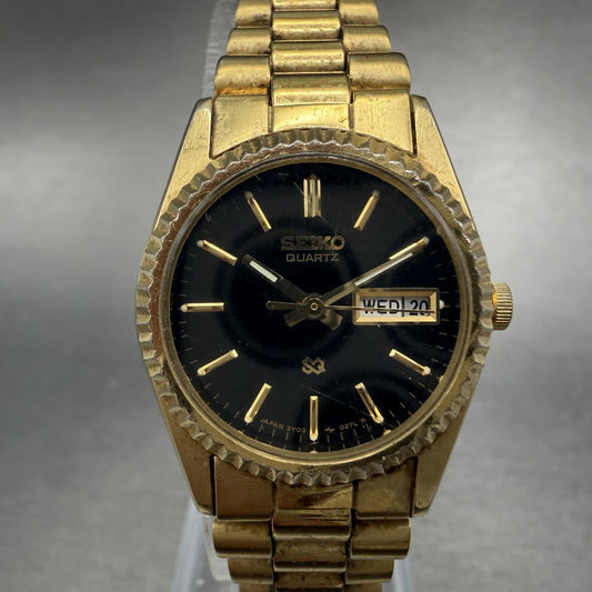 Seiko SQ Watch Women 24mm Black Dial Gold Tone Daydate 24mm Round New Battery 9R0