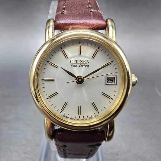 Citizen Eco-Drive Watch Women 23mm Silver Dial Gold Tone Date E011-S049423 Works0