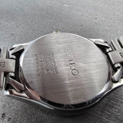 Seiko Solar Watch Women 28mm MOP Dial Two Tone Date Gemmed V137-0AA0 Works JP 879