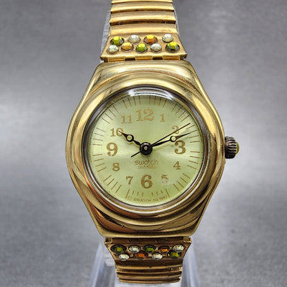 Swatch Irony FLORA Watch Women 25mm Champagne Dial Roes Gold Tone Round New Batt