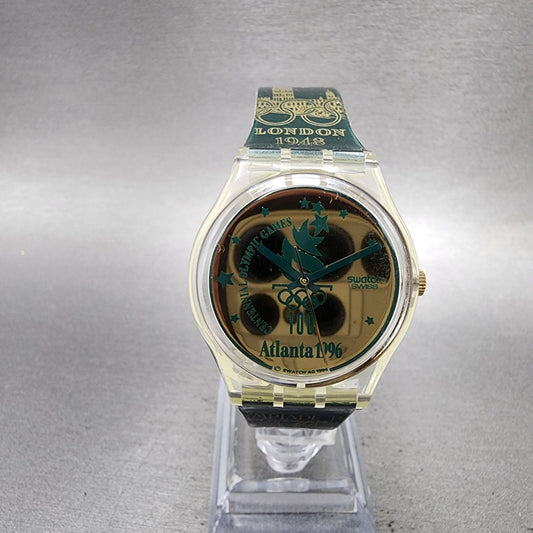 Swatch Olympics 1996 Watch Men 34mm Gold Dial Clear Round GZ136 New Battery0