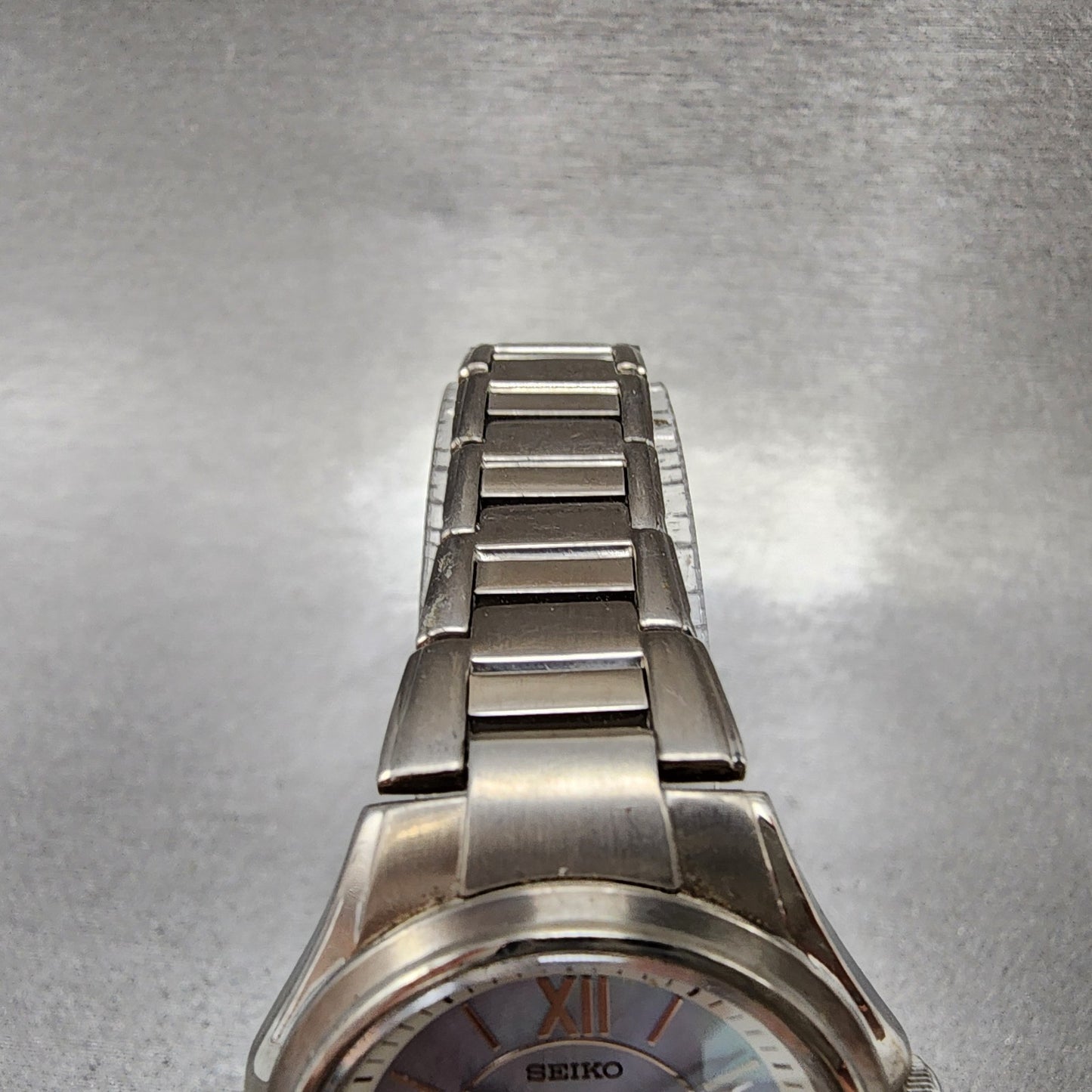 Seiko Solar Watch Women 29mm MOP Dial Titanium Date Round V1820AA0 Runs4