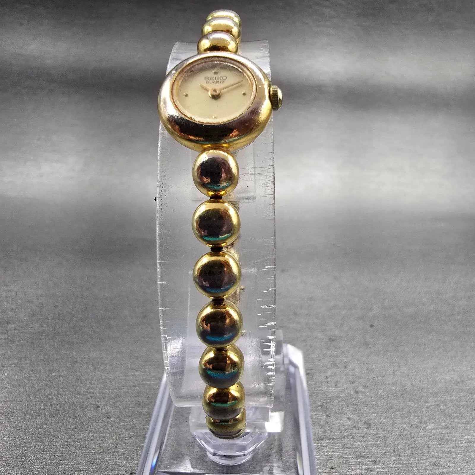 Seiko Watch Women 14mm Champagne Dial Gold Tone Round 1E20-0079 New Battery VTG5