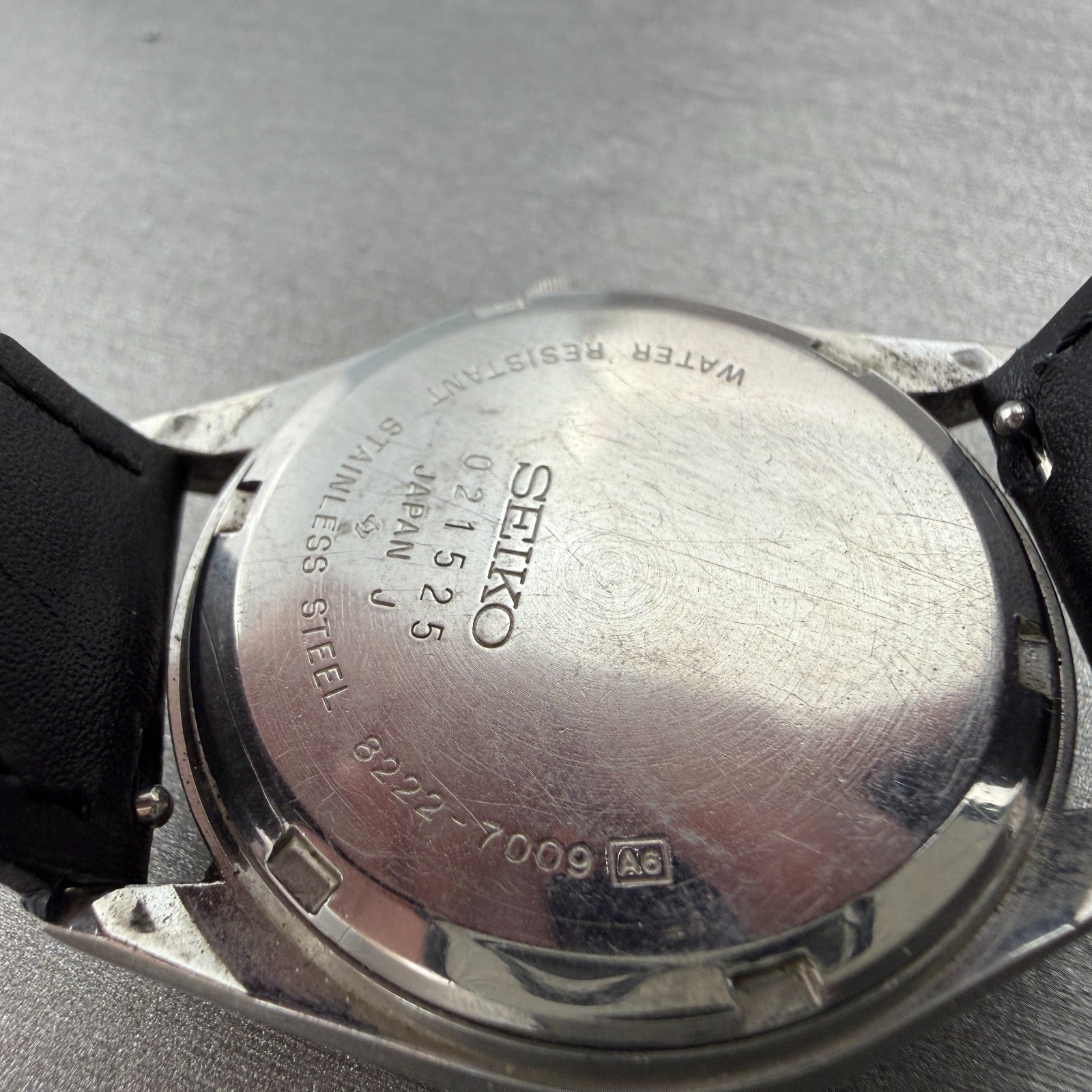 Seiko SQ Watch Men 34mm Black Dial Silver Tone Date 8222-7009 New Battery VTG9