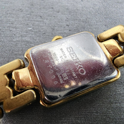 Seiko Tank Watch Women 16mm White Dial Gold Tone Rectangle 1N006T10 New Battery9