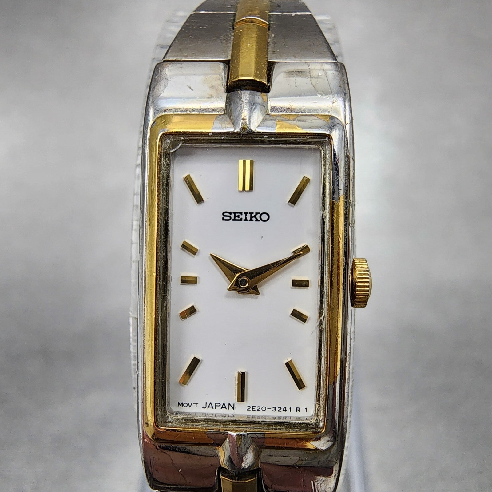 Seiko Watch Women 13mm White Dial Two Tone Rectangle 2E207479 New Battery C5671