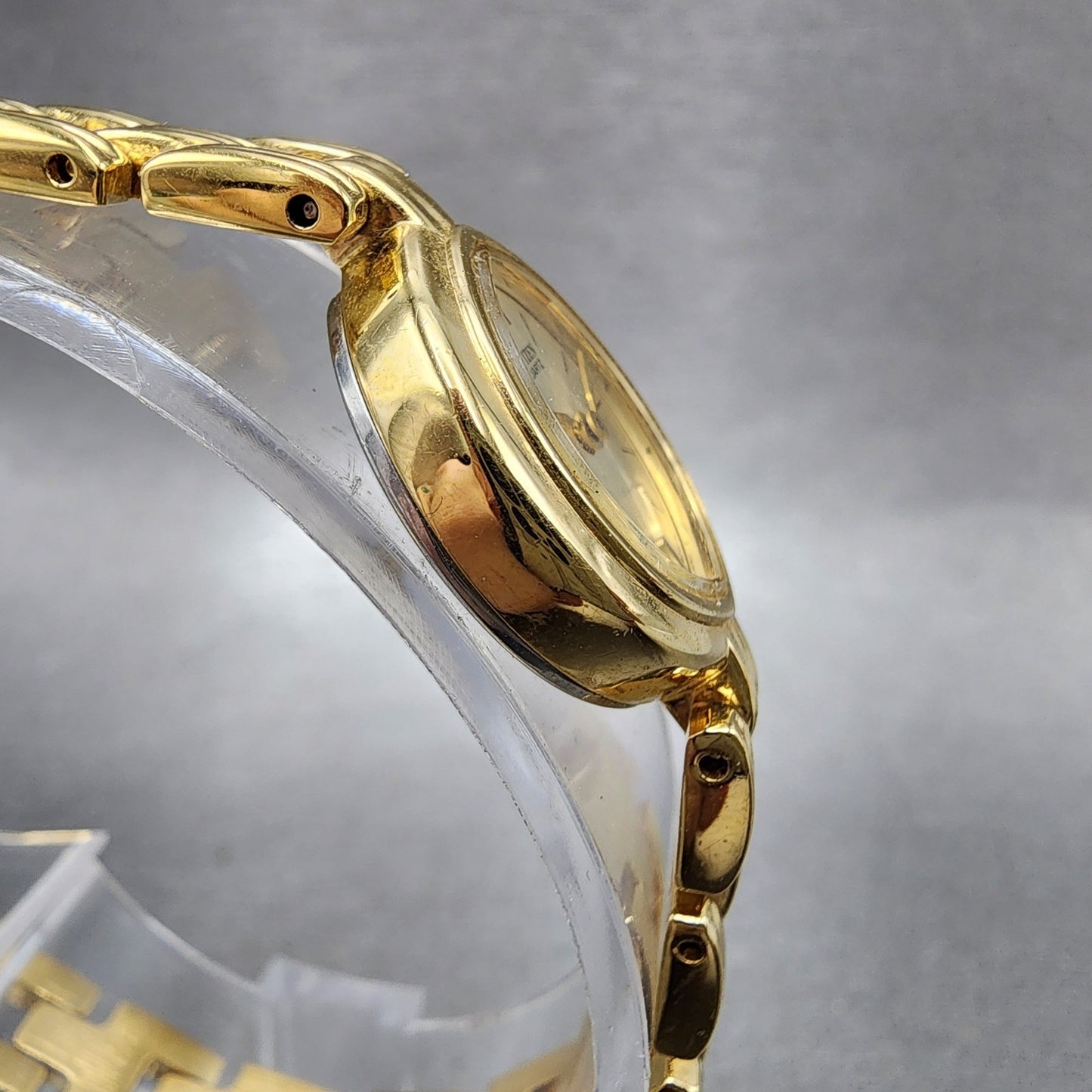 Citizen Watch Women 16mm Champagne Dial Gold Tone Oval 3220307825 New Battery3