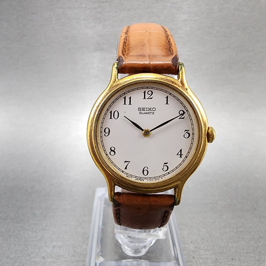 Seiko Watch Women 26mm White Dial Gold Tone Round V7006091 New Battery0