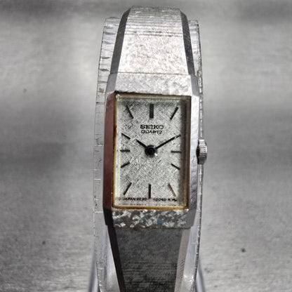 Seiko Watch Women 12mm Silver Dial Silver Tone Rectangle 2E20-5029 New Battery0