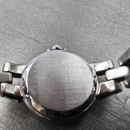 Seiko Solar Heart Watch Women 22mm Purple Dial Silver Tone Round V117-0BB0 Runs9
