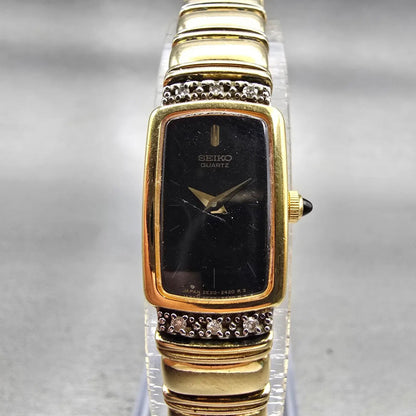 Seiko Watch Women 13mm Black Dial Gold Tone Gemmed Rectangle 2E20-6929 New Batt0