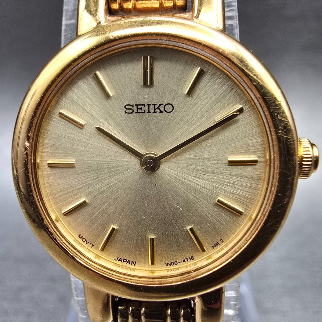 Seiko Watch Women 21mm Champagne Dial Gold Tone Round 1N00-1E09 New Battery JP21