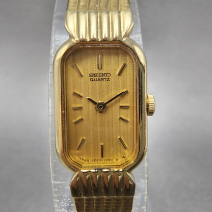 Seiko Tank Watch Women 13mm Champagne Dial Gold Tone 2e206019 New Battery0